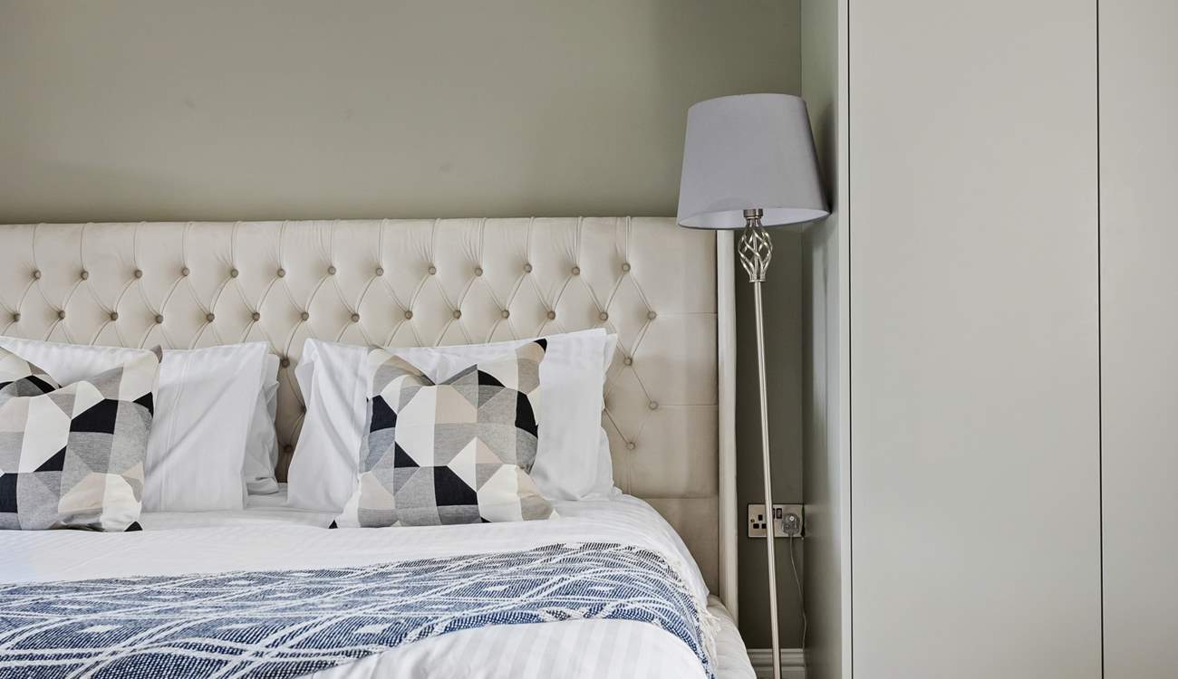 This gorgeous room also has a Smart TV for bedtime viewing. 
