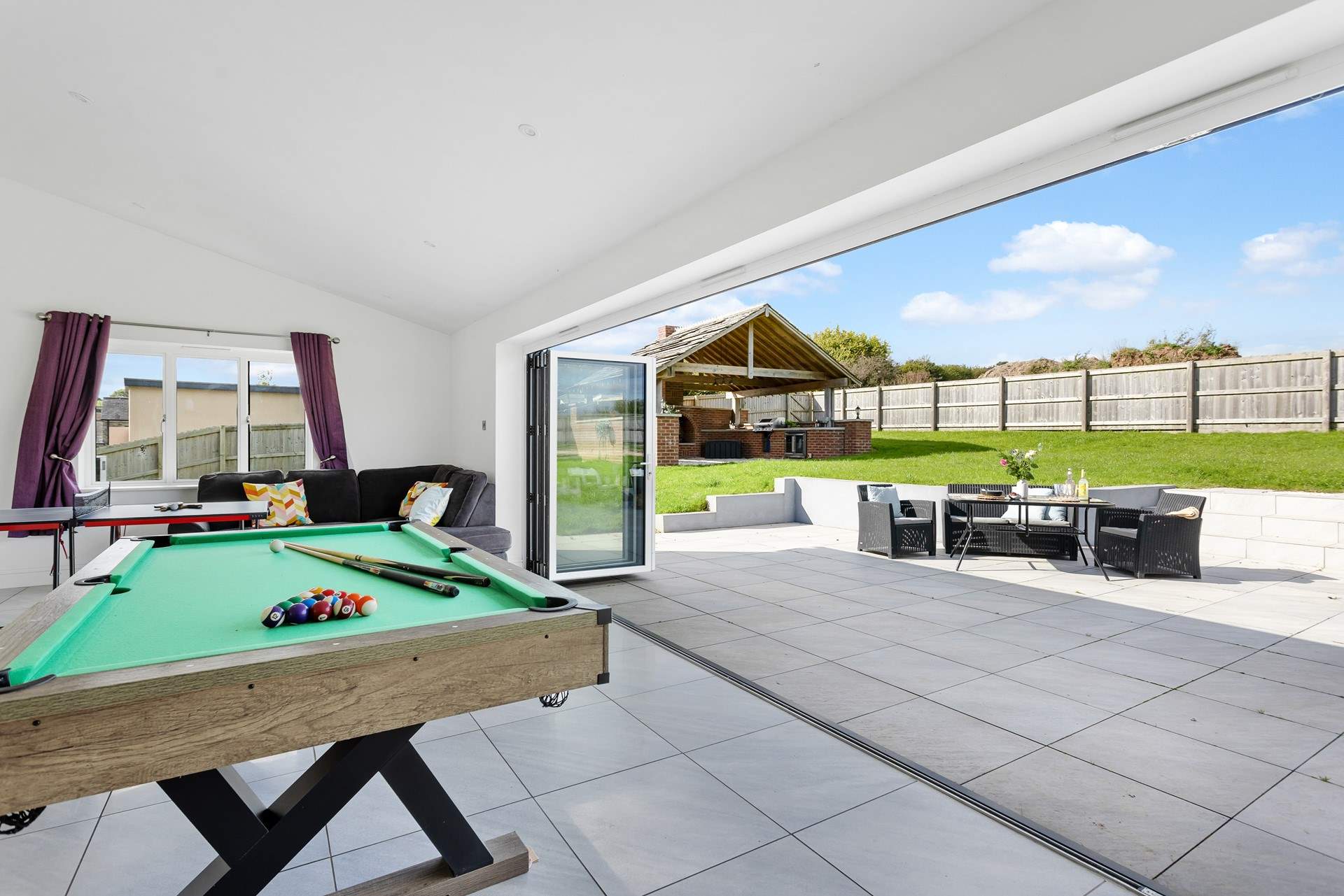The huge bi-fold doors really connect the inside with the great outdoors.