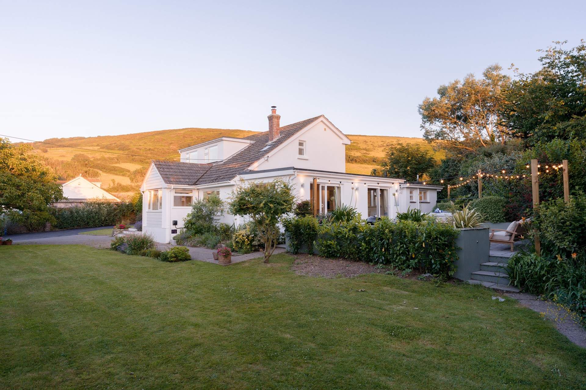To the side of the house you will discover the hot tub patio - perfect for those later evenings.