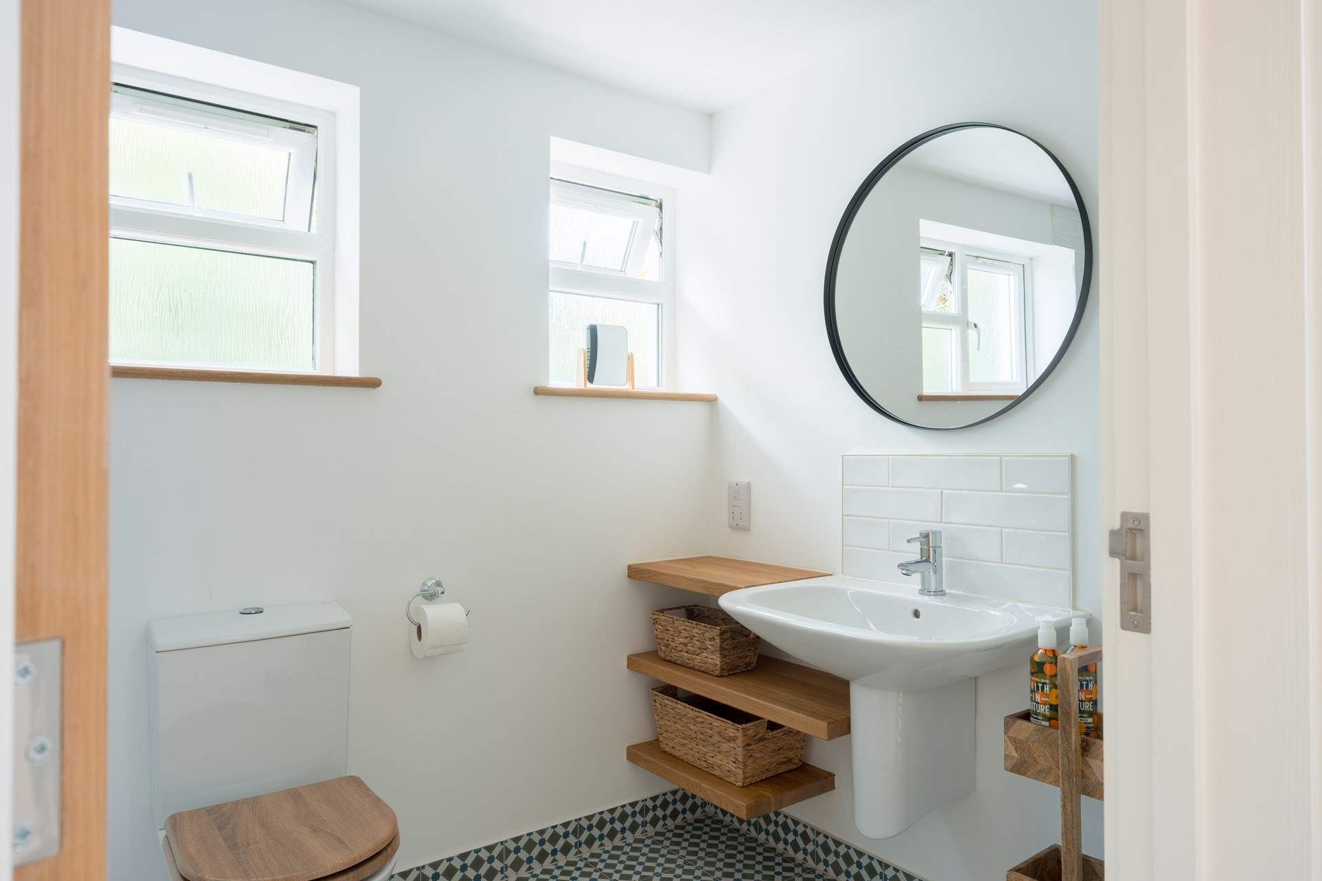 Your en suite shower-room with oak shelves and a spacious walk-in shower.