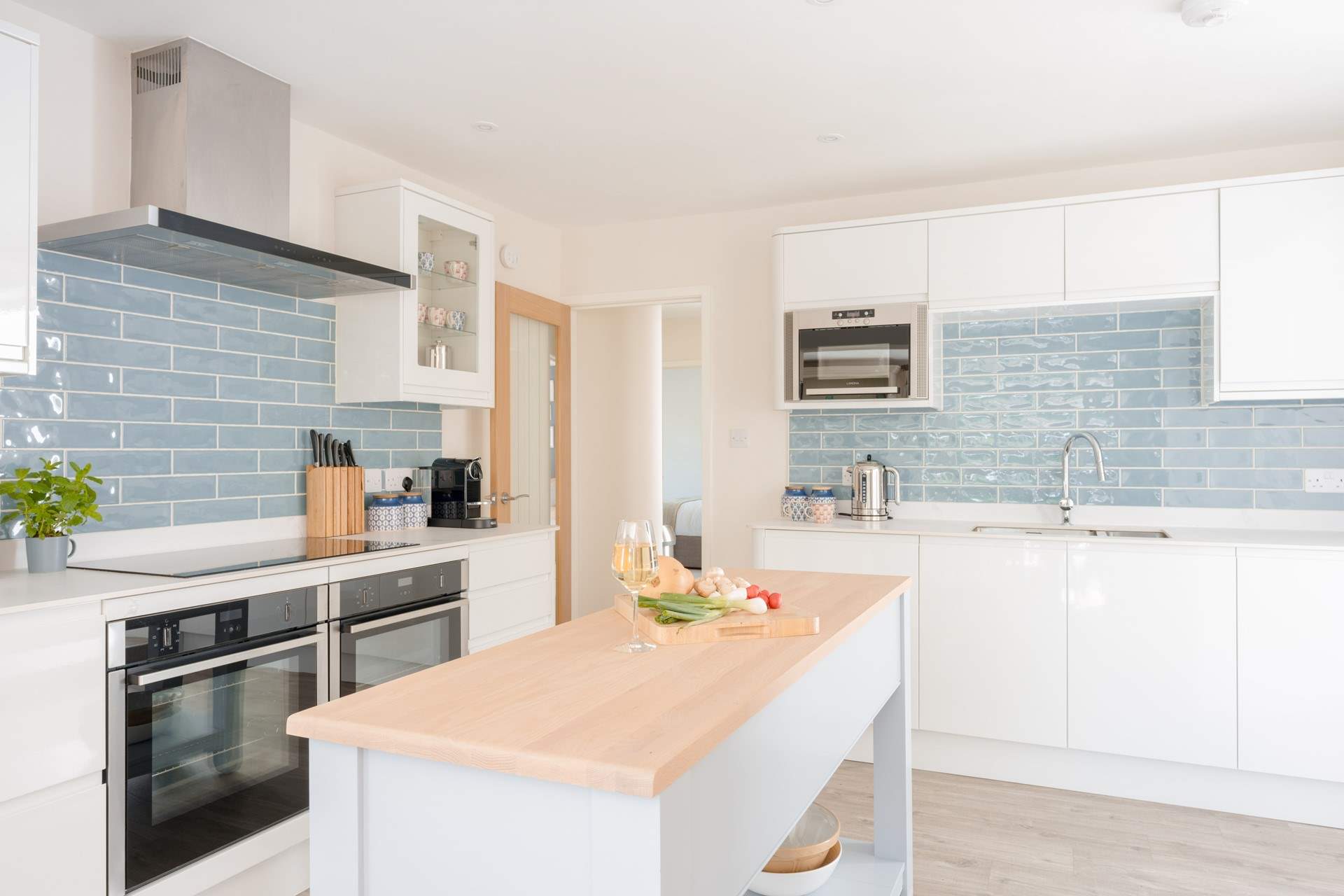 The kitchen sits in the heart of the house linking all the rooms throughout the ground floor.