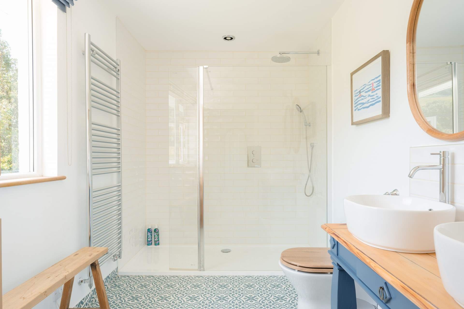 Enjoy the spacious waterfall shower.