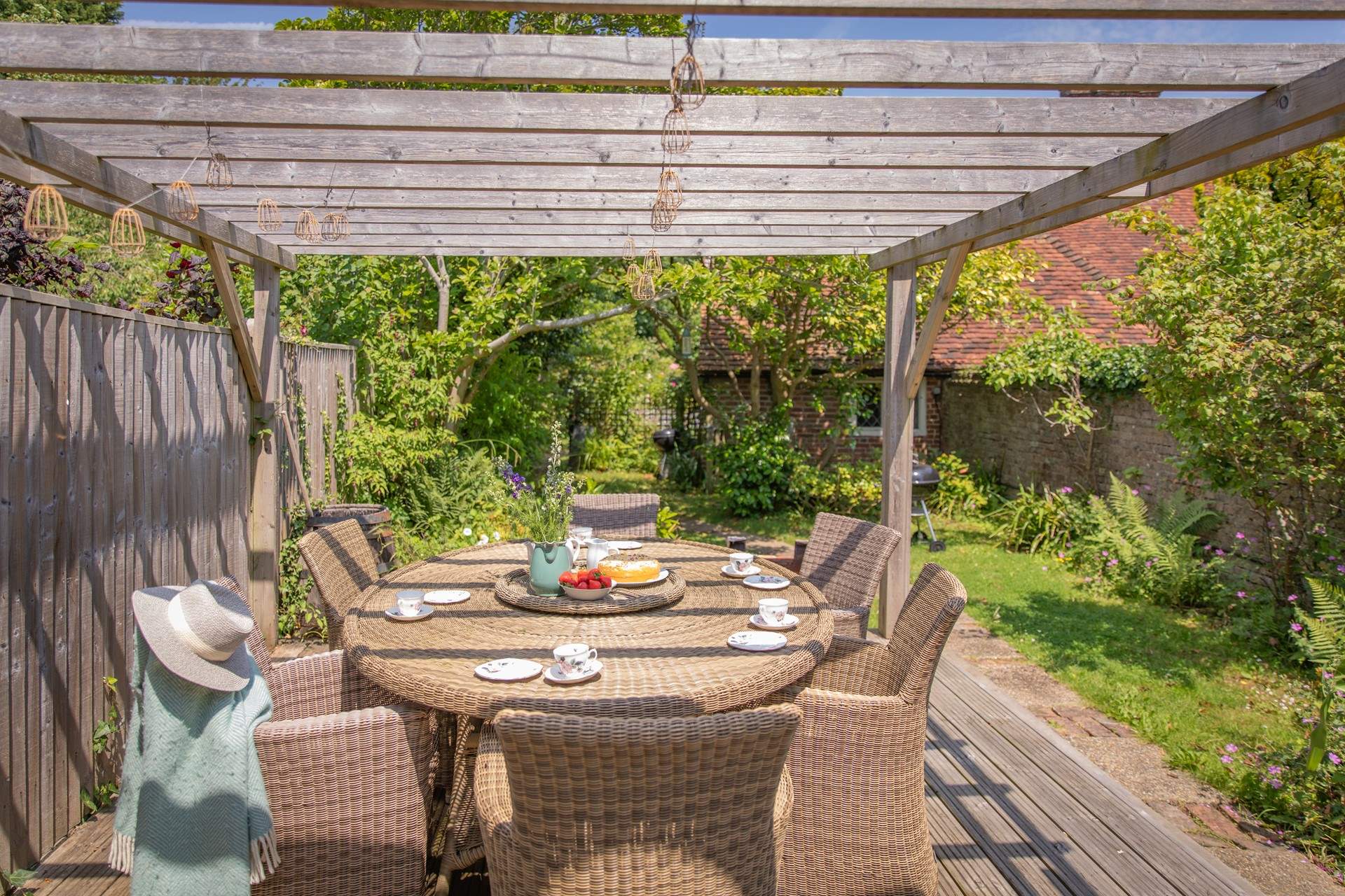 There are two charcoal barbecues and plenty of space for outdoor entertaining.