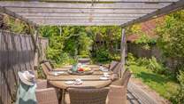 There are two charcoal barbecues and plenty of space for outdoor entertaining.
