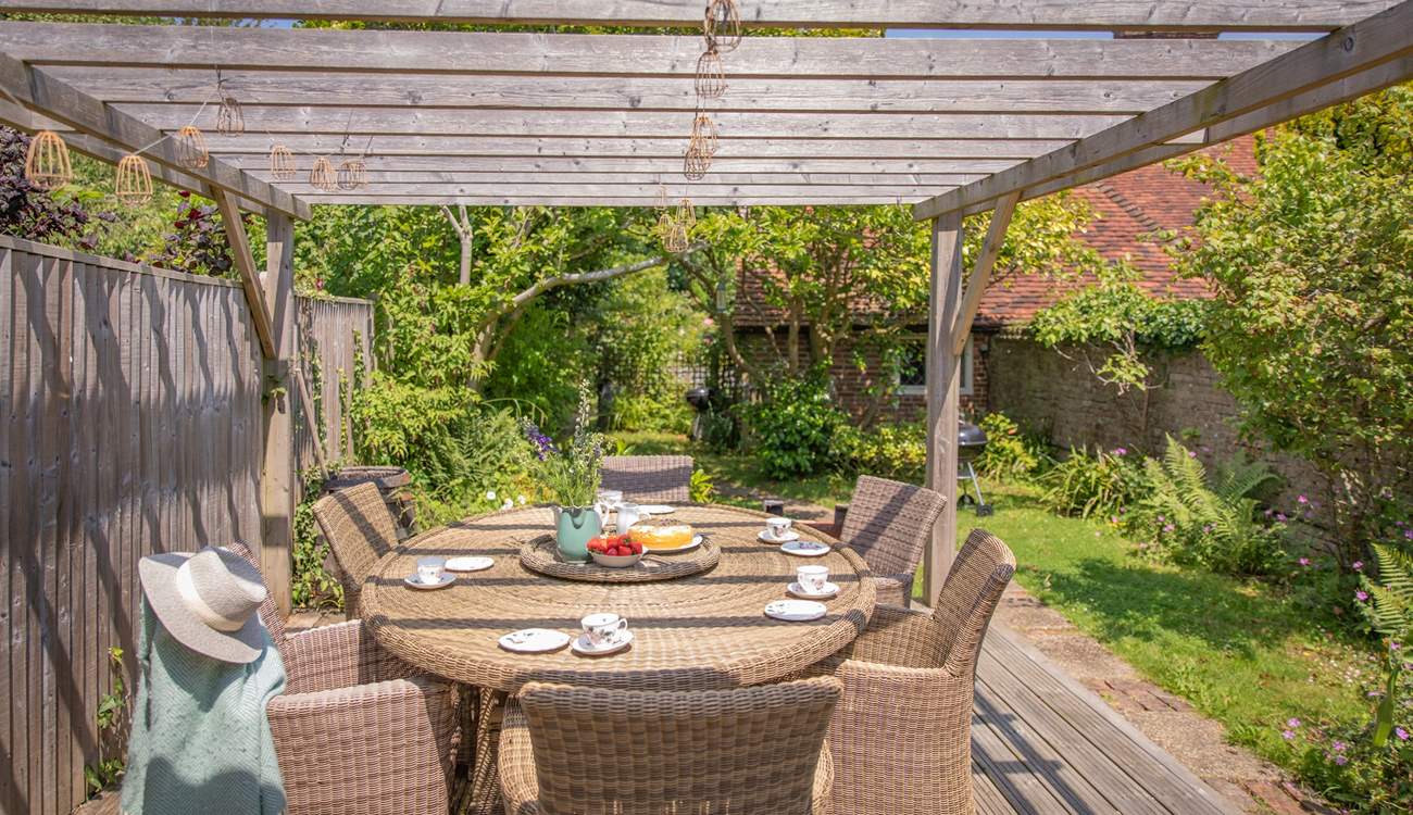 There are two charcoal barbecues and plenty of space for outdoor entertaining.