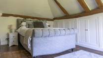 Bedroom 2 - The bedrooms have lots of historic charm with sloping ceilings and floors.