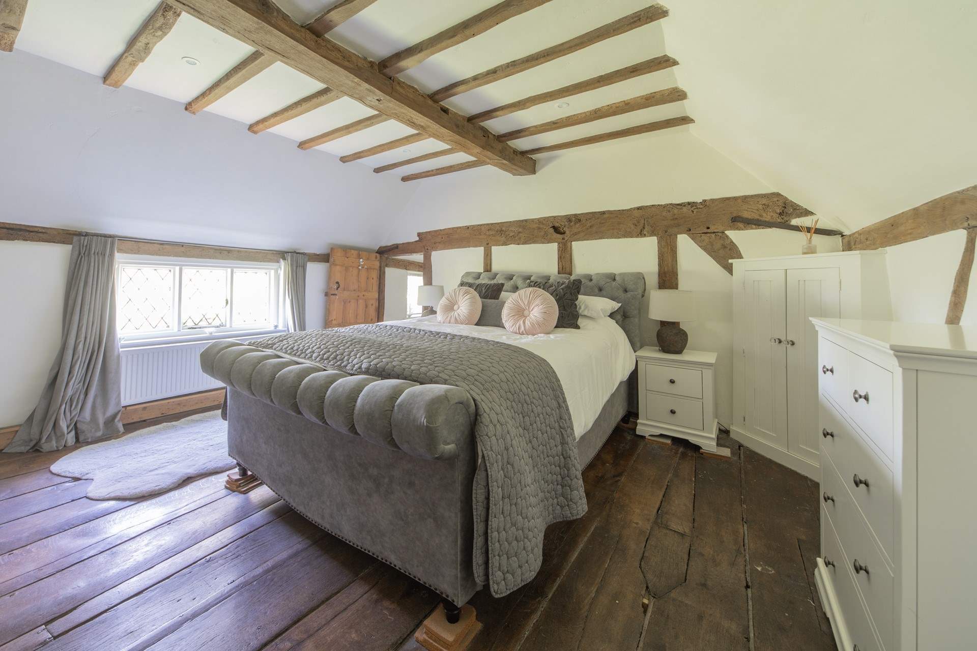 King-size double bed with access to the en suite bathroom.