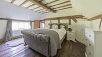 Bedroom 3 - King-size double bed with access to the en suite bathroom.