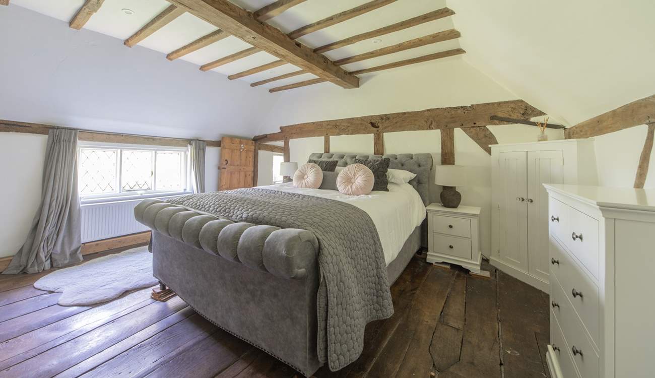 Bedroom 3 - King-size double bed with access to the en suite bathroom.
