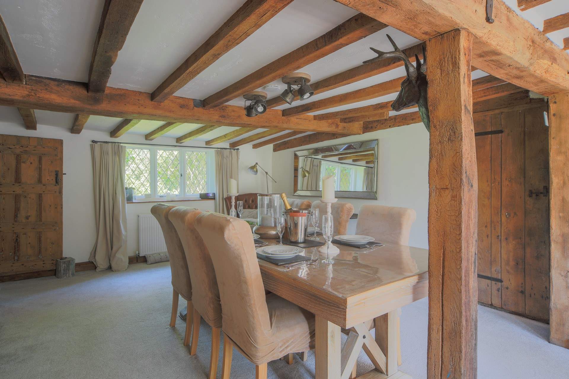 The dining-table has enough seating for six guests.