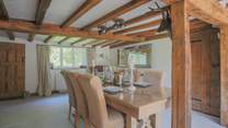 The dining-table has enough seating for six guests.