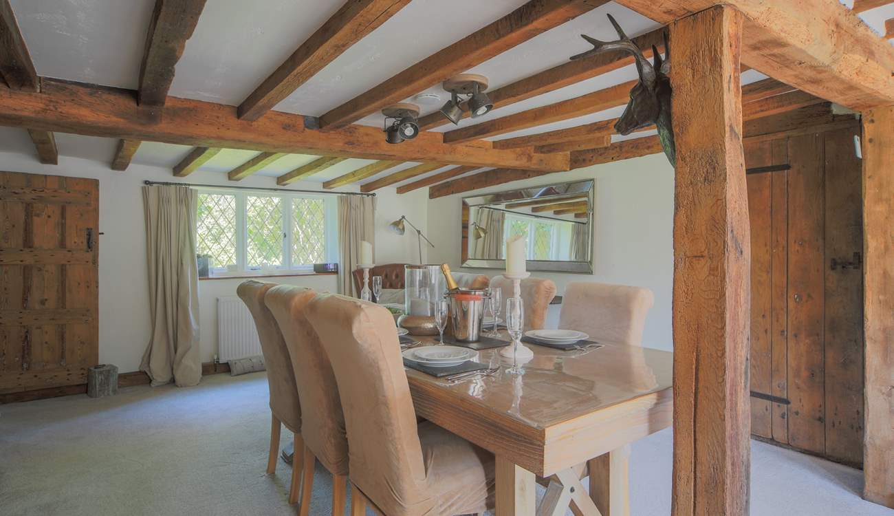 The dining-table has enough seating for six guests.