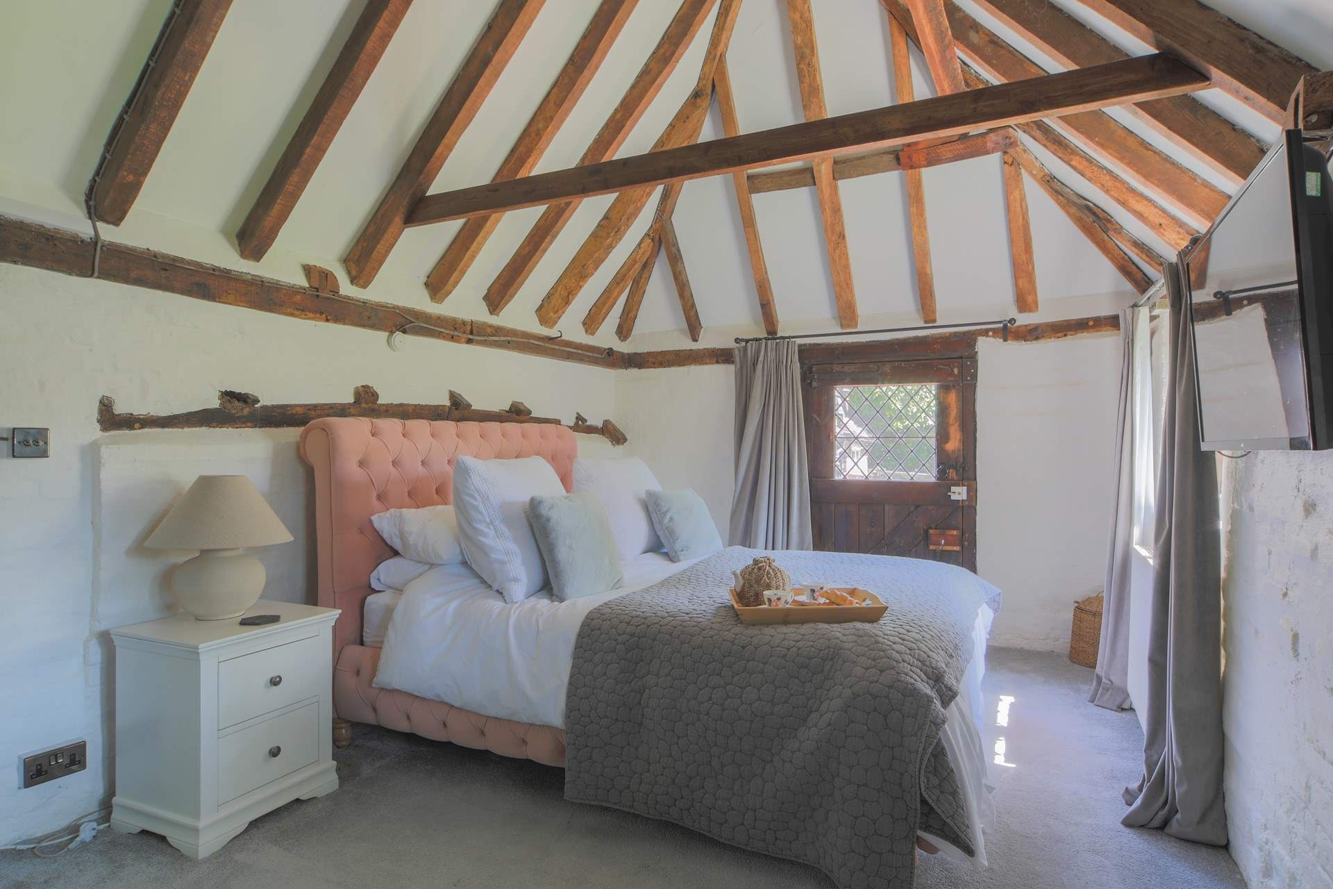 Bedroom 1 is on the ground floor and has access to the cottage garden.