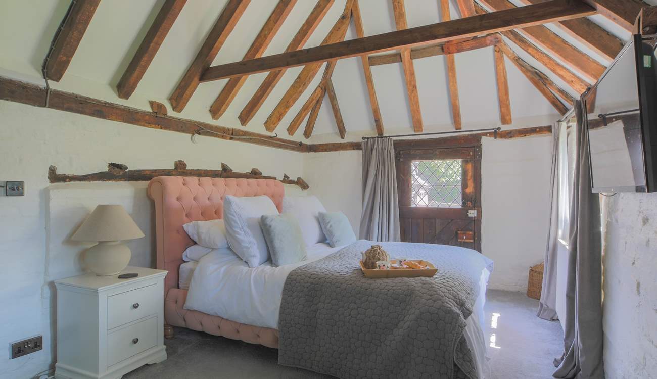Bedroom 1 is on the ground floor and has access to the cottage garden.