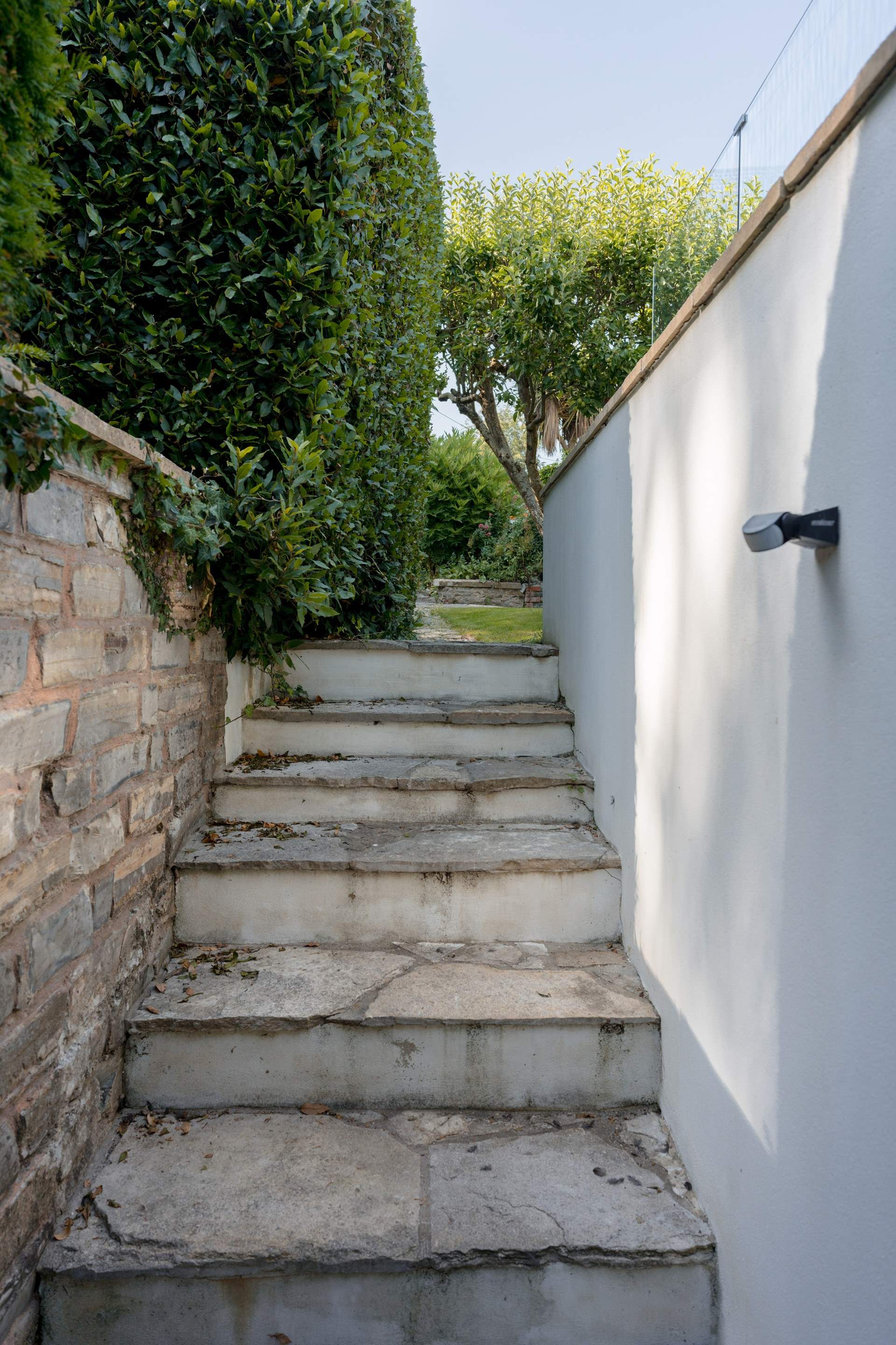 Steps up from the rear access to the garage.