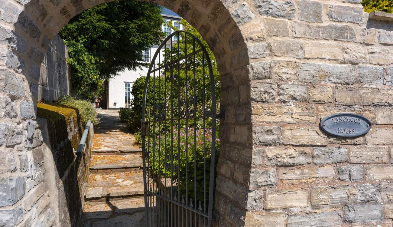 Pedestrian access is via the wrought iron gate and then a gentle climb up the steps to the house.