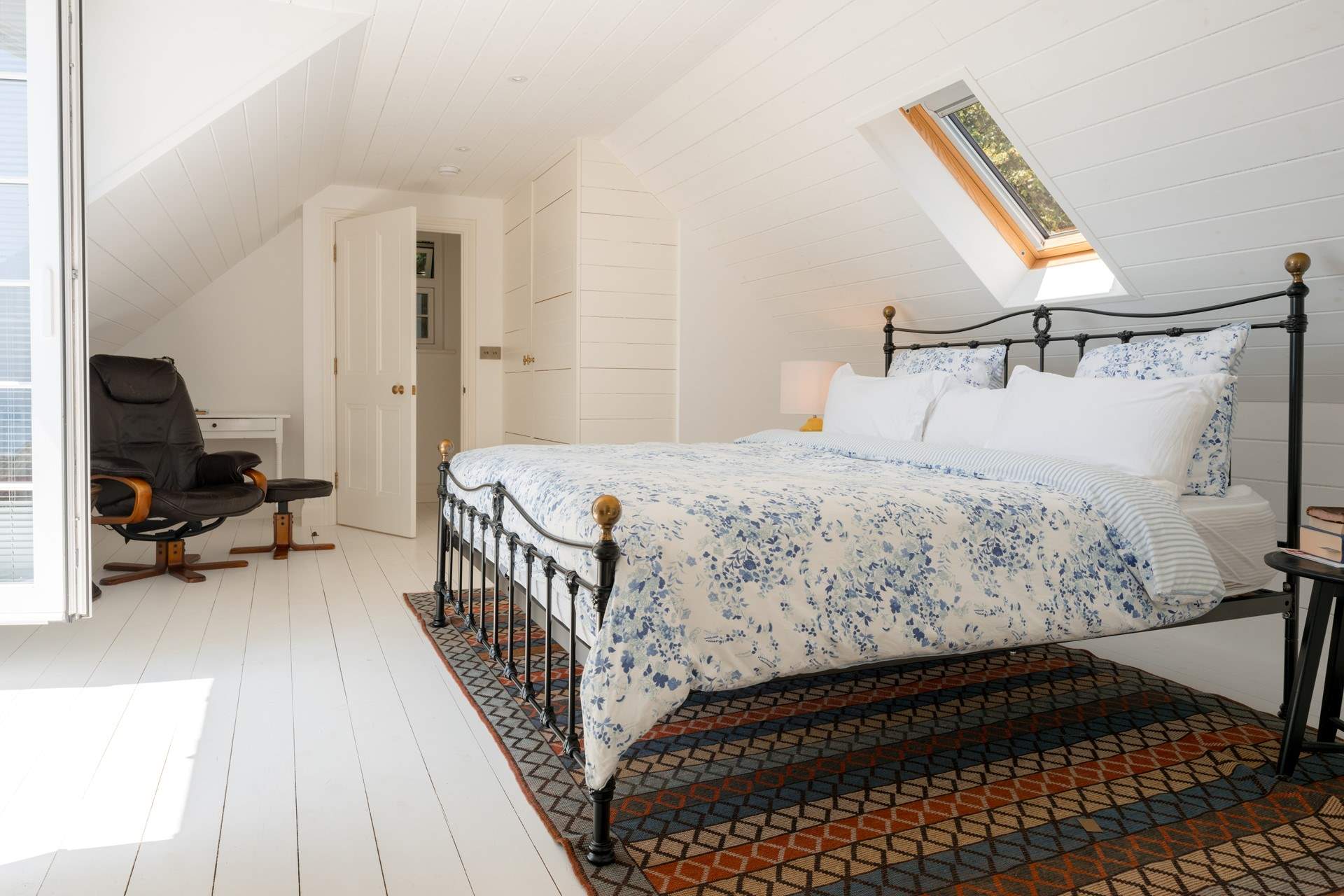 Just imagine sitting up in bed with the balcony doors open to the sea views beyond...