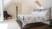 Just imagine sitting up in bed with the balcony doors open to the sea views beyond...