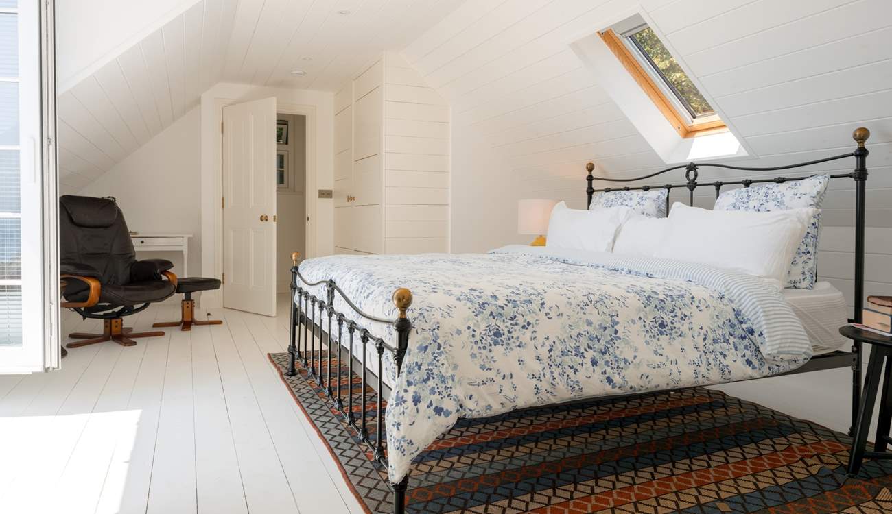 Just imagine sitting up in bed with the balcony doors open to the sea views beyond...