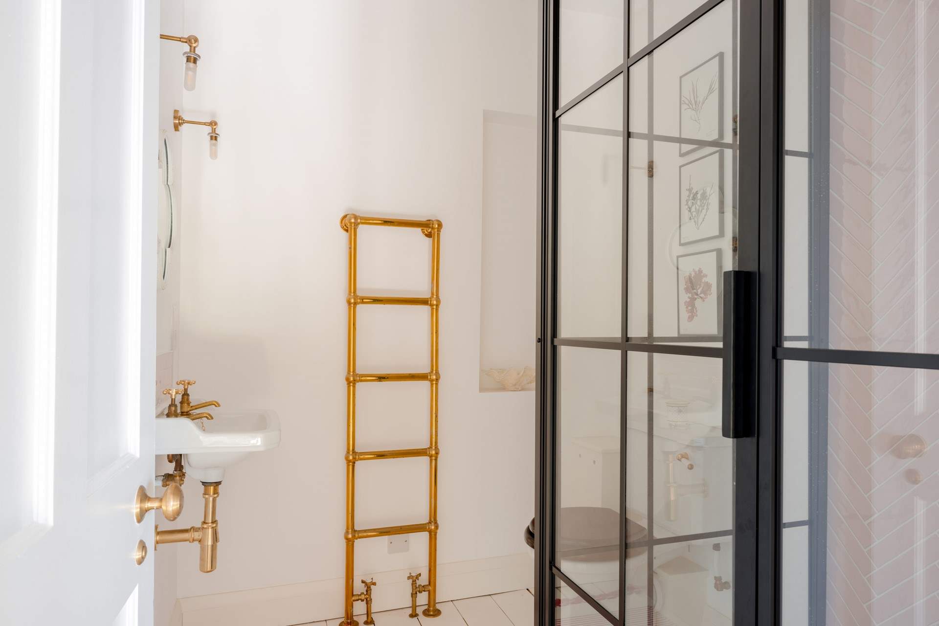 Completing the first floor is another curated and spacious shower-room.