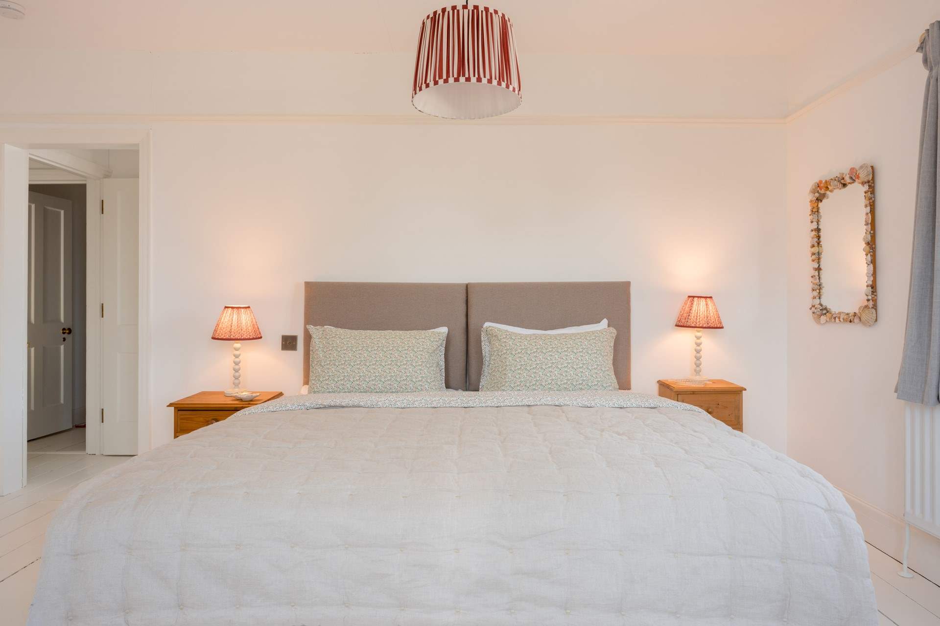 Bedroom 3 has a very calming feel and features a super-king-size 'zip and link' bed (which can be split into two large singles on request).