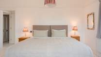 Bedroom 2 has a very calming feel and features a super-king-size 'zip and link' bed (which can be split into two large singles on request).