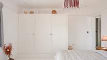 Each bedroom has plenty of storage and hanging options.