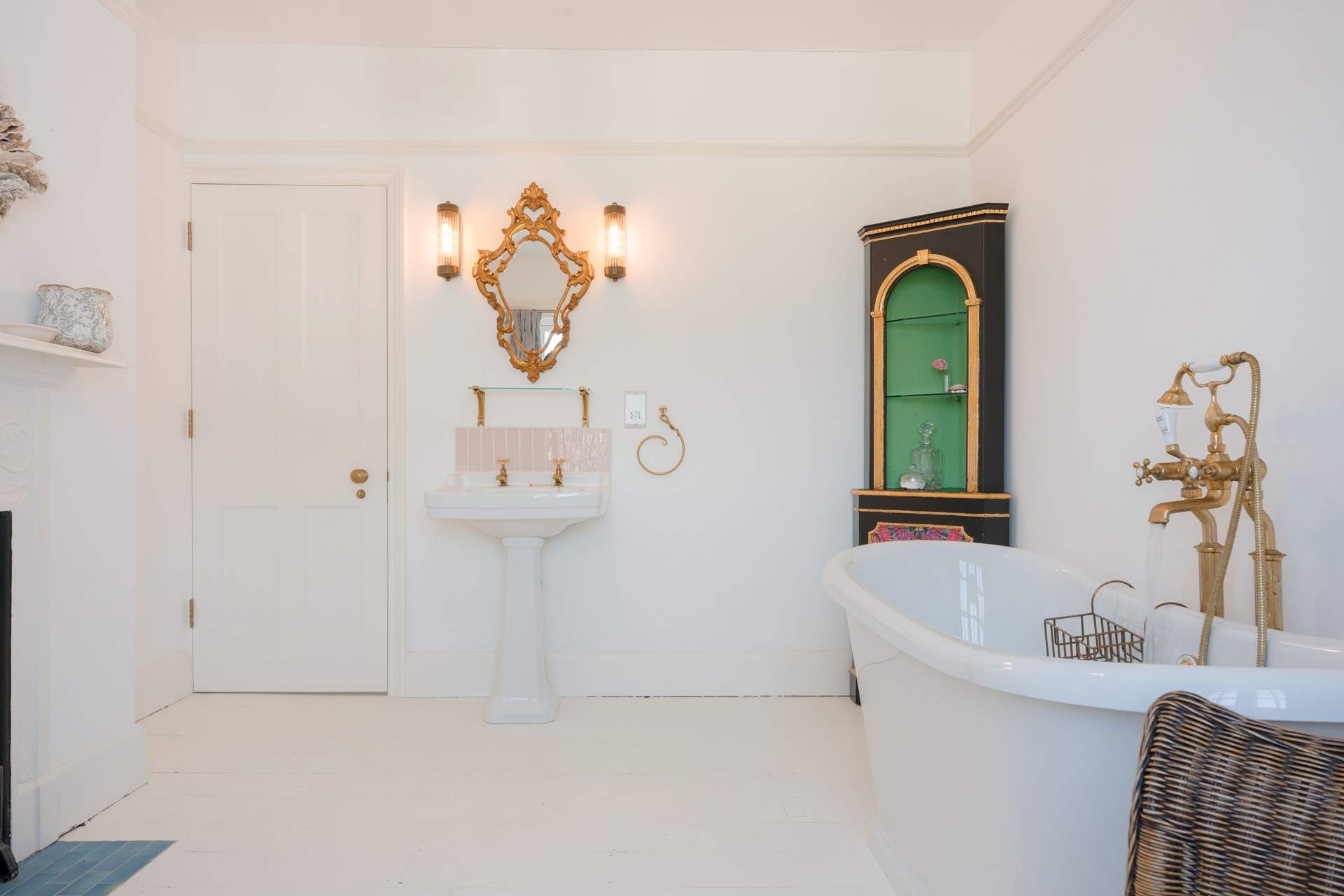 The family bathroom is wonderfully grand and packed with style and original features.