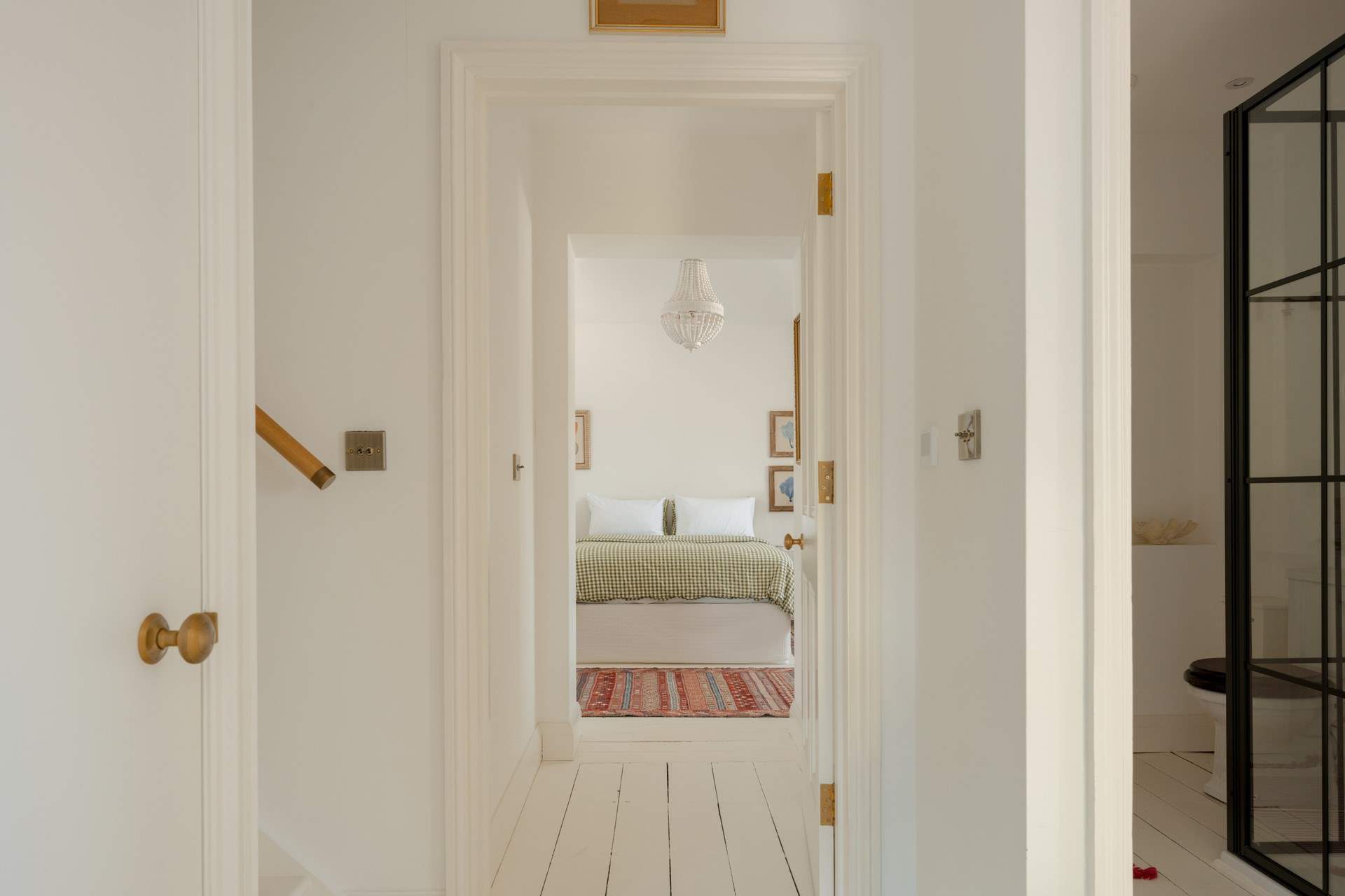 Heading down the stairs to the first floor you will find three more large bedrooms, a family bathroom and separate shower-room.