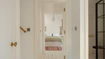 Heading down the stairs to the first floor you will find three more large bedrooms, a family bathroom and separate shower-room.