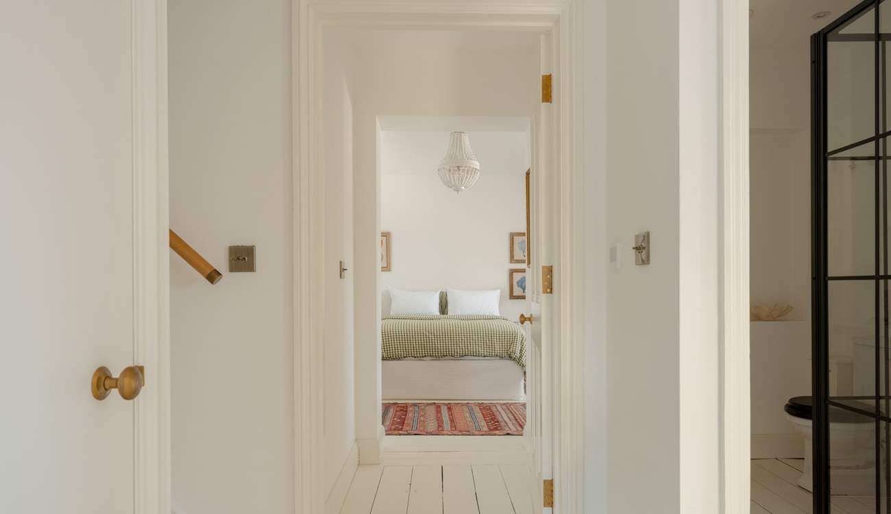 Heading down the stairs to the first floor you will find three more large bedrooms, a family bathroom and separate shower-room.