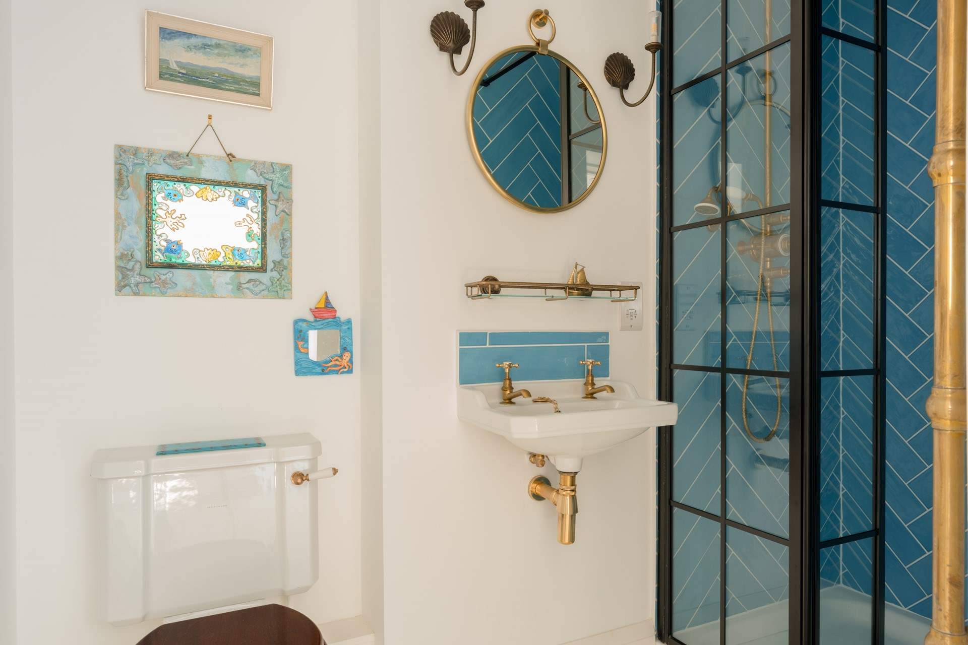 This luxury en suite is beautifully styled and features a large shower enclosure.