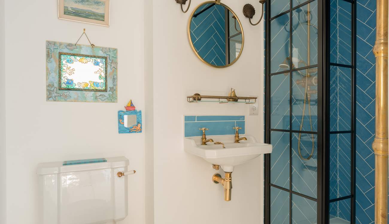 This luxury en suite is beautifully styled and features a large shower enclosure.