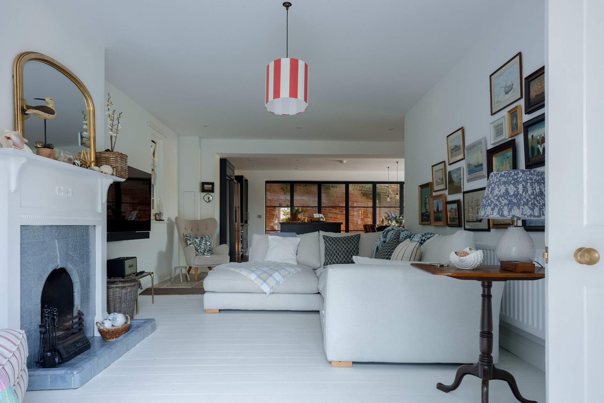 The sitting-area is a wonderfully cosy space with an open fire and plenty of comfy seating...