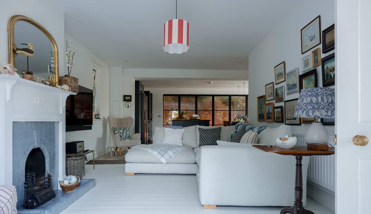The sitting-area is a wonderfully cosy space with an open fire and plenty of comfy seating...