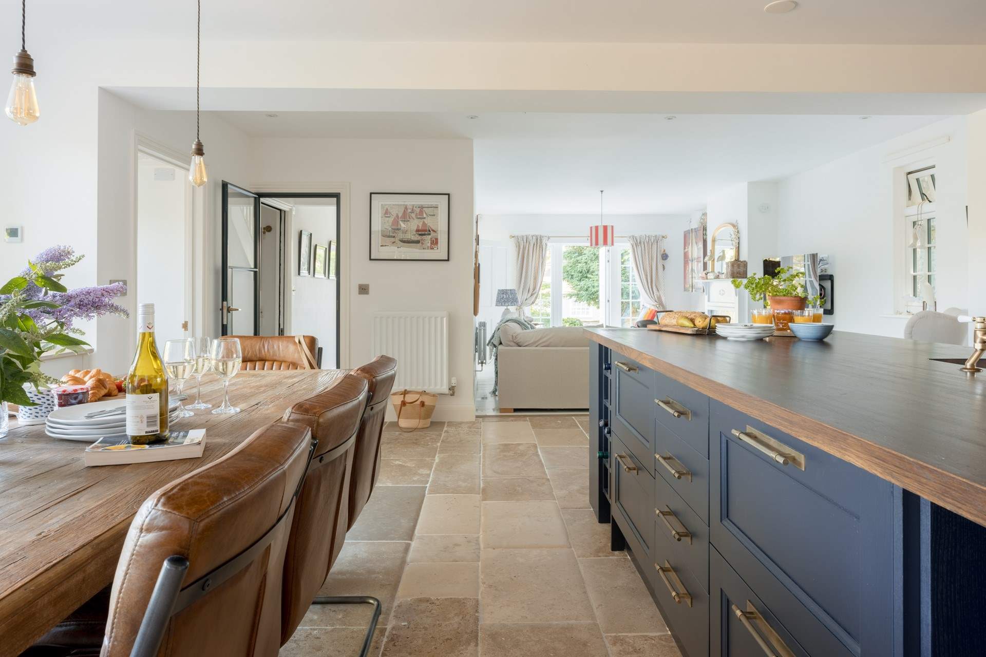 The bright open plan sitting-area is just off the kitchen/diner and really does complete the perfect social arrangement.
