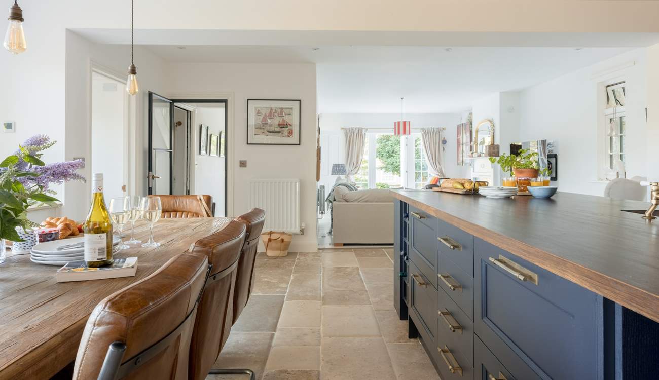 The bright open plan sitting-area is just off the kitchen/diner and really does complete the perfect social arrangement.