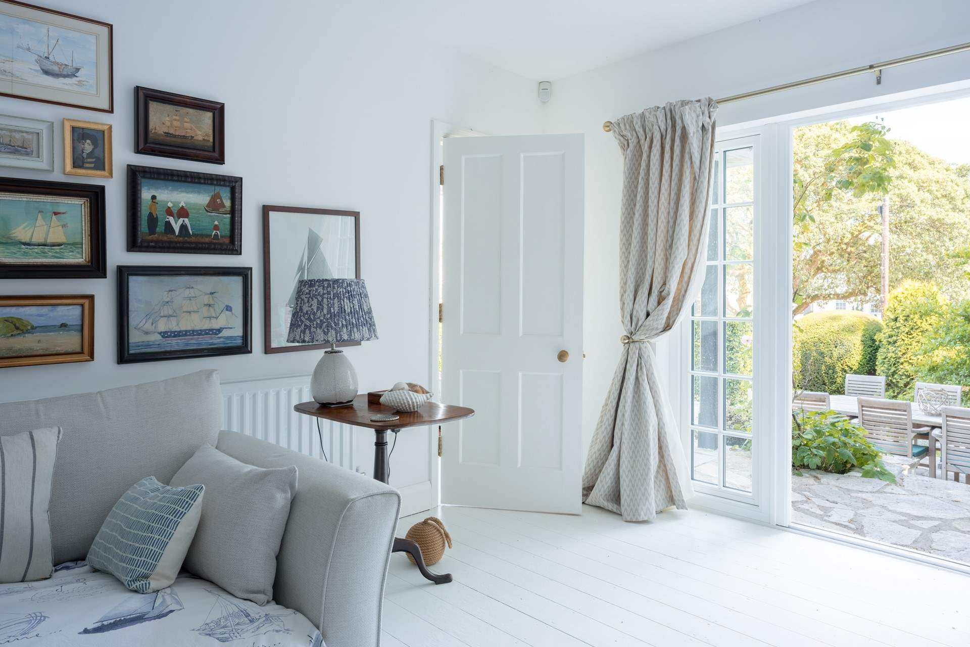 The French doors out to the upper patio really do connect you to the garden and the buzz of the town.