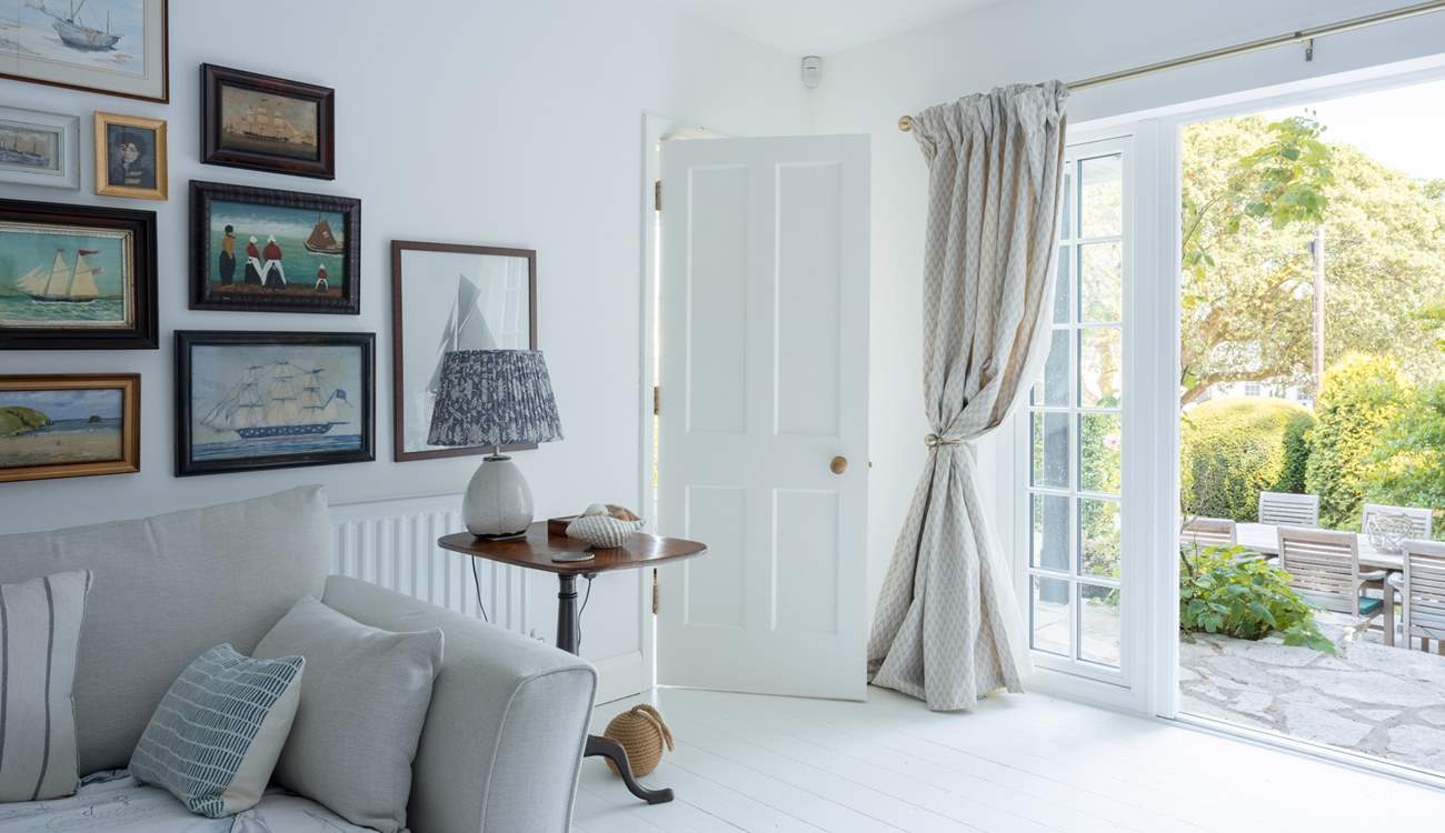The French doors out to the upper patio really do connect you to the garden and the buzz of the town.