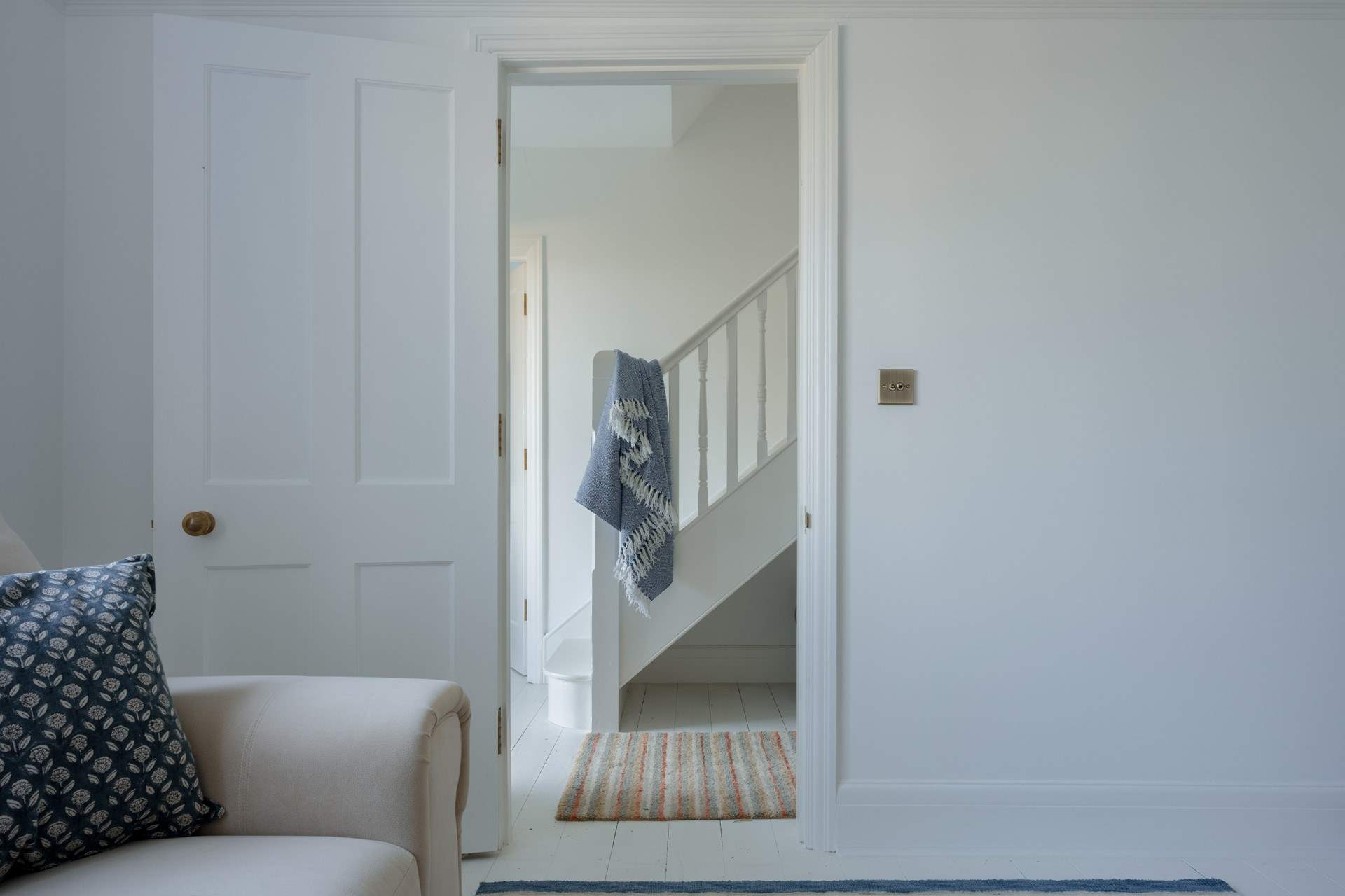 The main staircase is off the central hallway and will lead you up two floors to the four fabulous bedrooms.