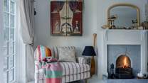 Imagine curling up here with a good book and gazing out over the gardens...