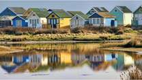 Try a walk up over Hengistbury Head to see the colourful beach huts and beaches of Mudeford.