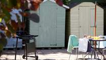 How about a bit of open air dining or a barbecue? The beach hut storage sheds are a little reminder that the sea is just around the corner...