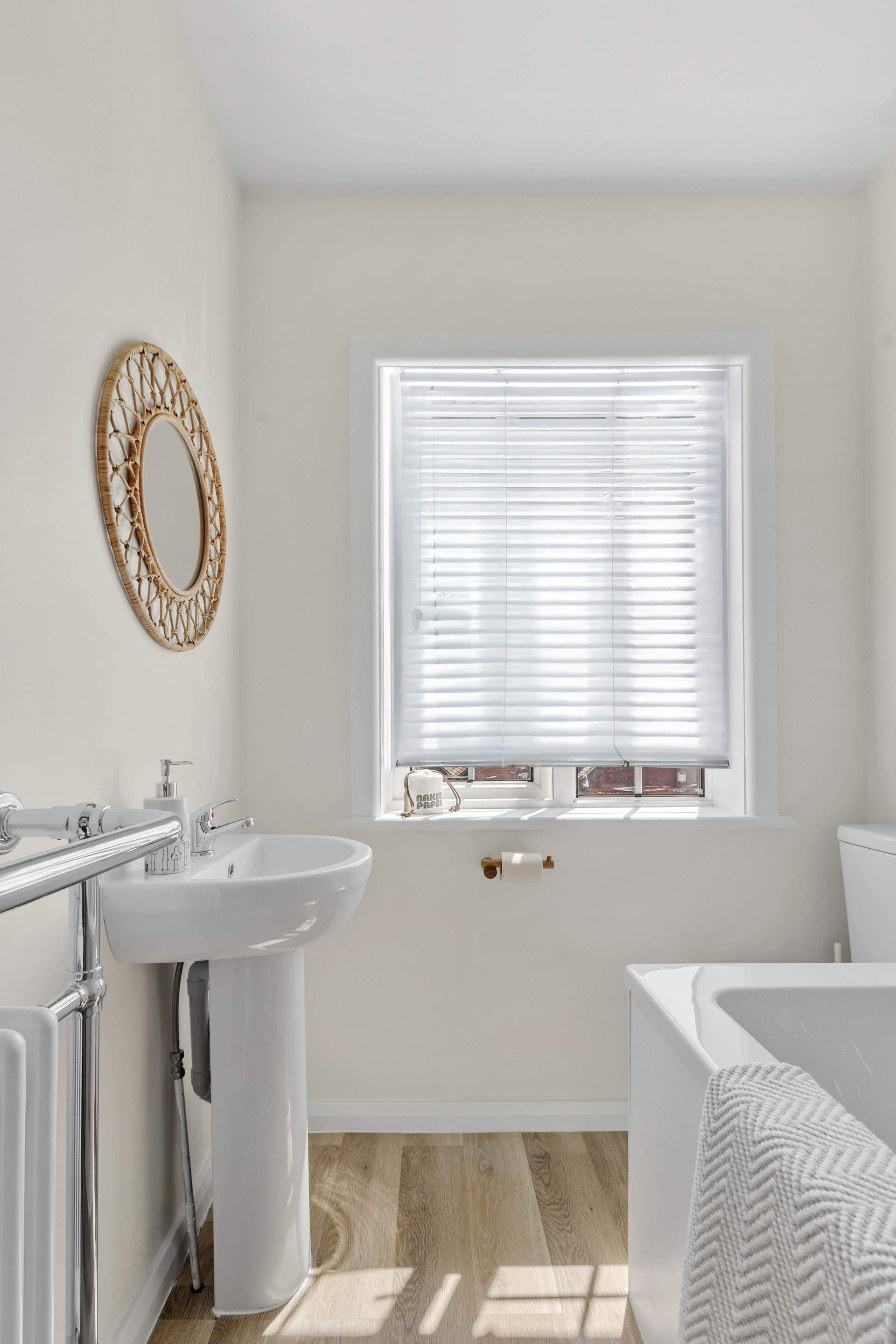 Lots of natural light in the family bathroom.
