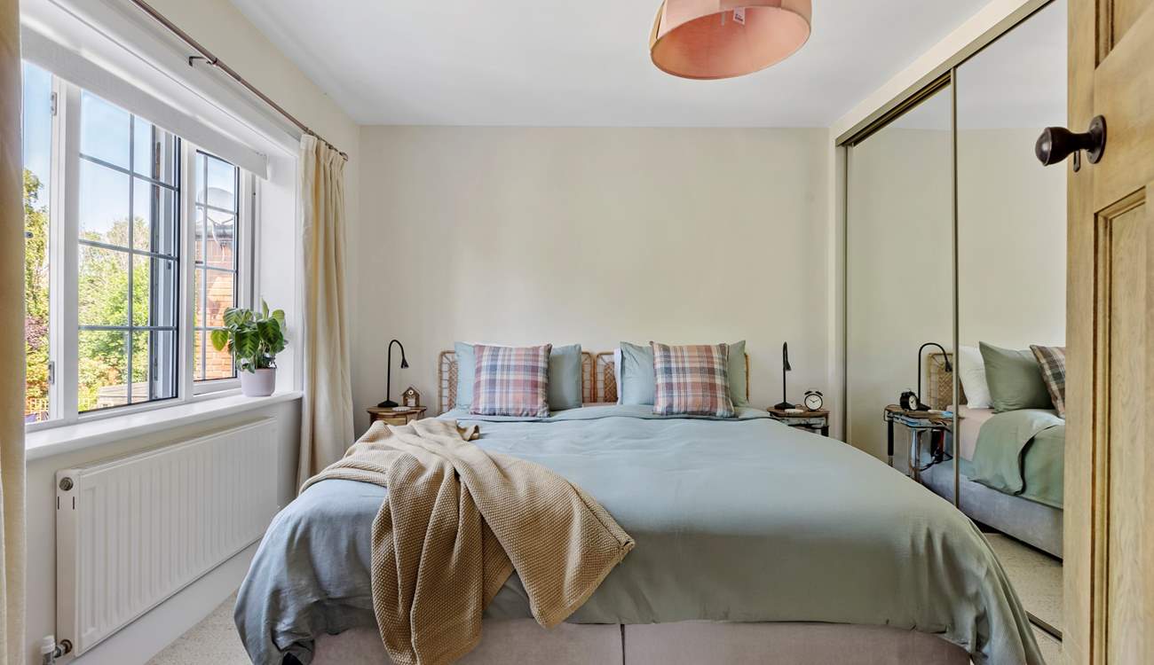 The primary bedroom is peaceful perfection. Super soft linen and a sumptuous super-king size bed (can be split into two singles on request). No doubt you will sleep well here...