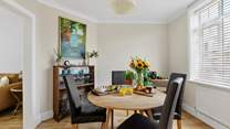 As you enter this lovely property you will find the open plan triple living space which starts with the tastefully styled dining-area.. 