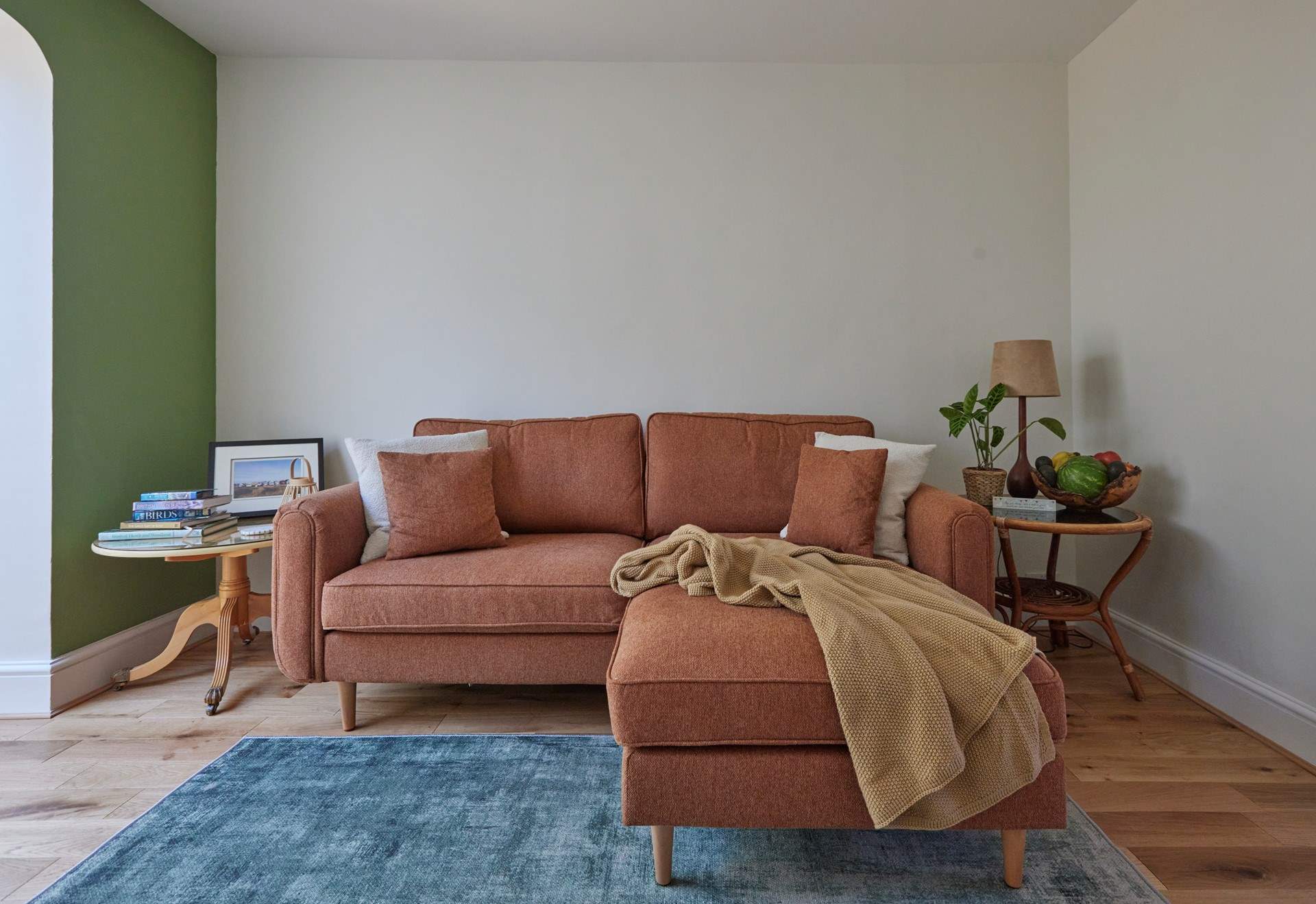 Soft furnishings and a curated palette create a wonderful place to cosy up and rest your limbs after a day exploring.