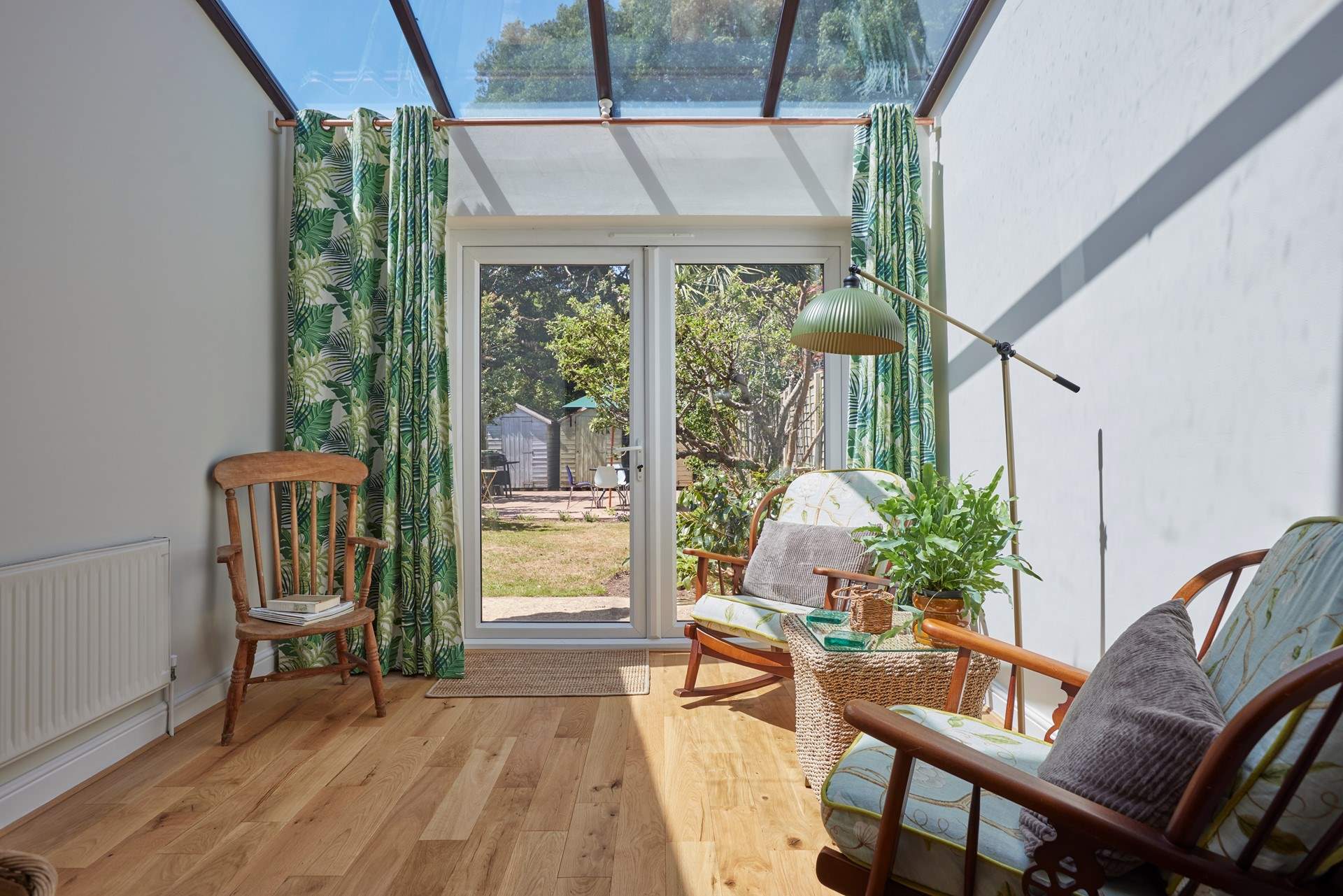 The sun-room is a real triumph - what a spot to gaze over the garden and soak in the rays.