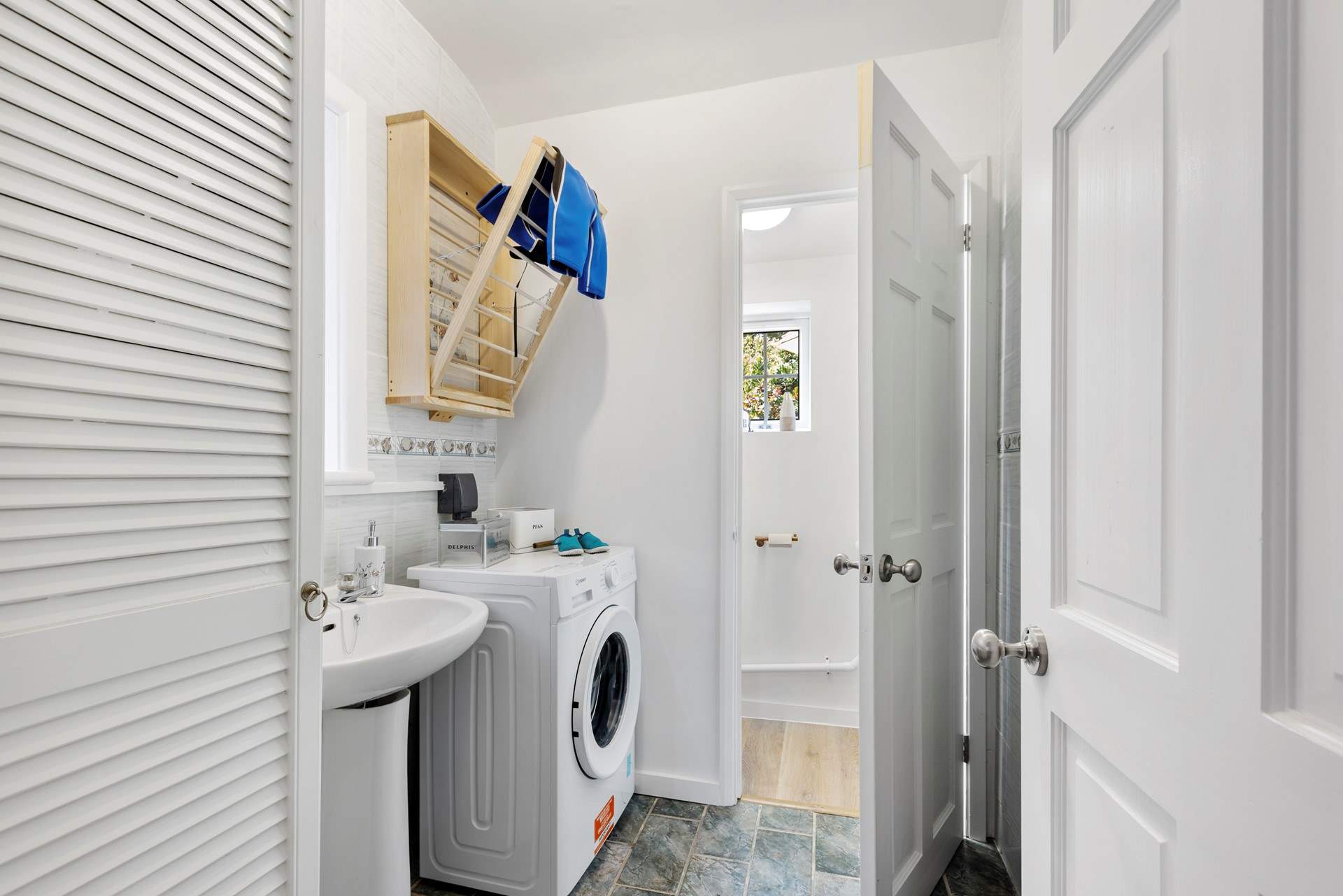 Off the kitchen is a large utility-room and WC. Very handy for drying wetsuits and dogs perhaps?