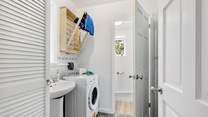 Off the kitchen is a large utility-room and WC. Very handy for drying wetsuits and dogs perhaps?